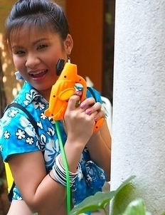 Anna Chung is having so much fun with her water gun. She looks like she could be the next Charlie's angel.