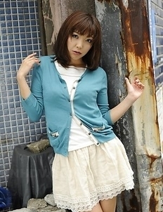 Juri Kitahara in blue sweater and lace skirt