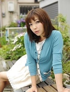 Juri Kitahara in blue sweater and lace skirt